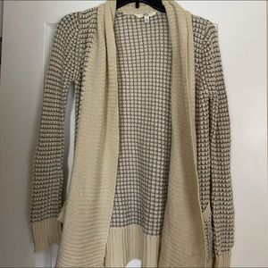 soft nude and grey colored cardigan with pockets